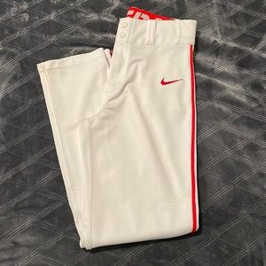 Nike baseball pants with red piping.